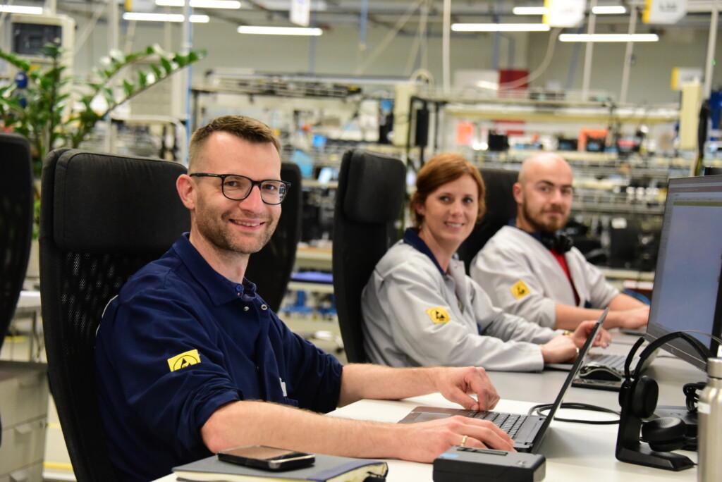 Scanfil employees working with cost optimization services in which includes BOM (Bill of Materials) reviews to maintain an optimal AVL, DFX reviews for continuous process improvements, and full Value Analysis/Value Engineering (VA/VE) studies to support iterative product improvements or larger next generation re-design scopes.