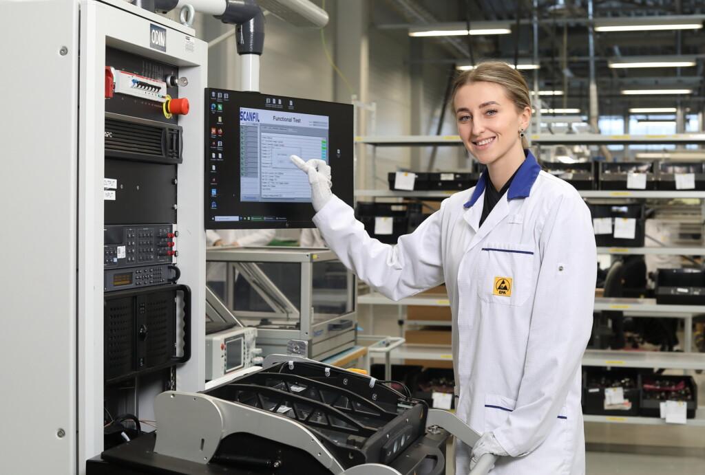 Scanfil employee working with test development at Scanfil factory.